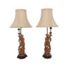 pair of carved figural lamps