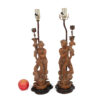 pair of carved figural lamps