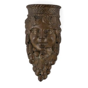 bronze face wall hanging