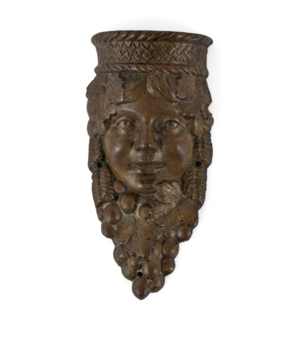 bronze face wall hanging