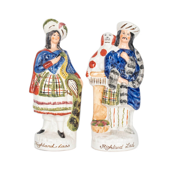 Pair of Staffordshire Highland Lad & Lass Porcelain Figures