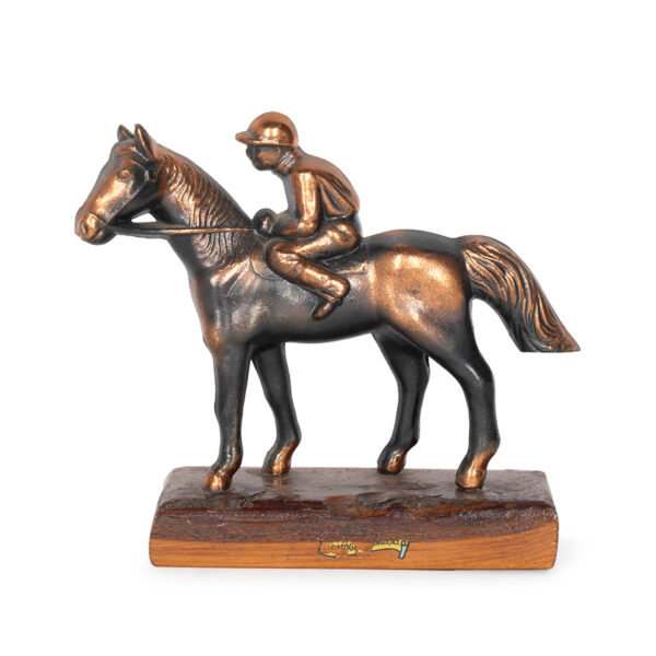 metal jockey on horse