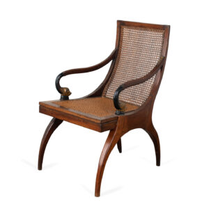 English Regency Carved Mahogany Ebonized and Parcel Gilt Library Chair with Cane Seat and Back